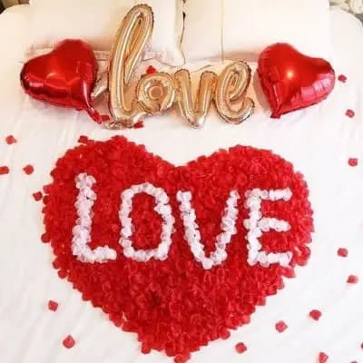 Rose Petals Heart on Bed